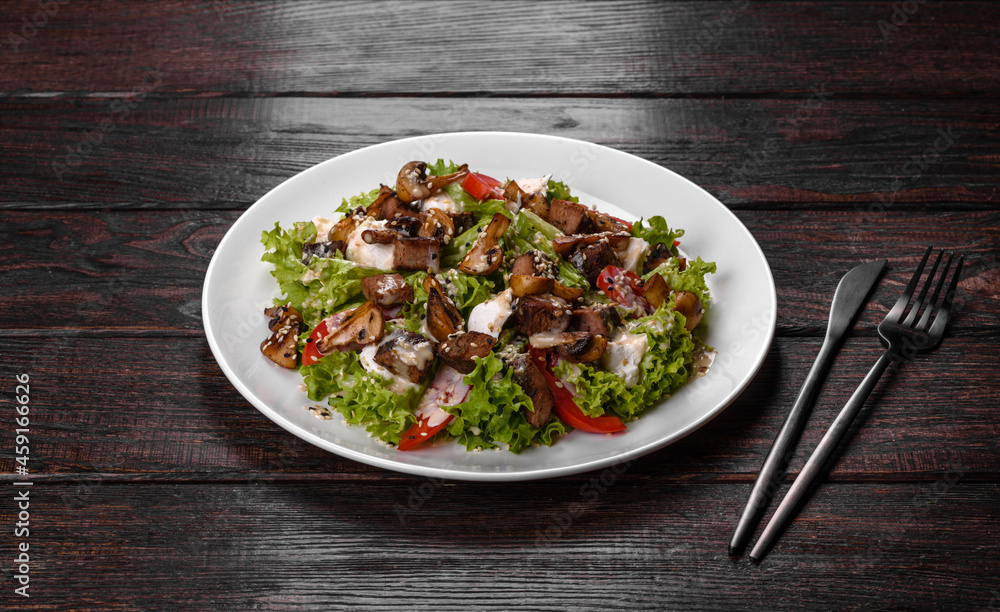 Delicious fresh beef salad for a festive table Delicious fresh beef salad for a festive table