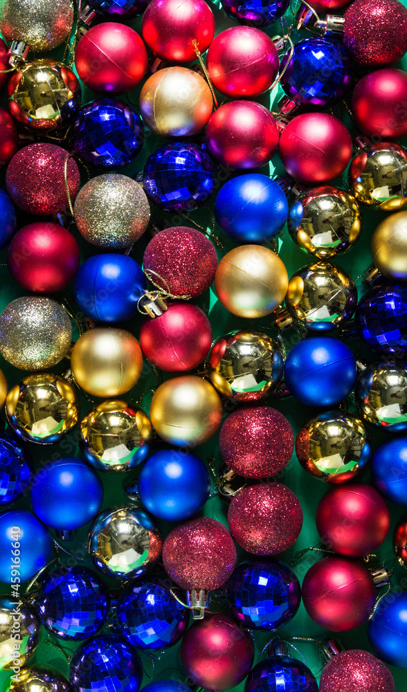 colored Christmas tree toys are scattered on the table colored Christmas tree toys are scattered on the table