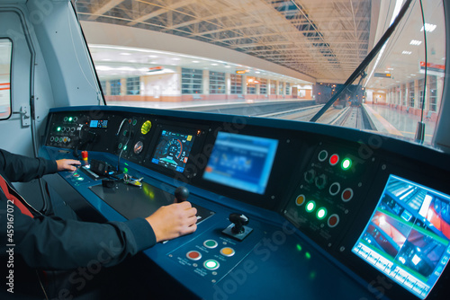 Metro train driver from operation cabin during the high speed in subway tunnel. photo