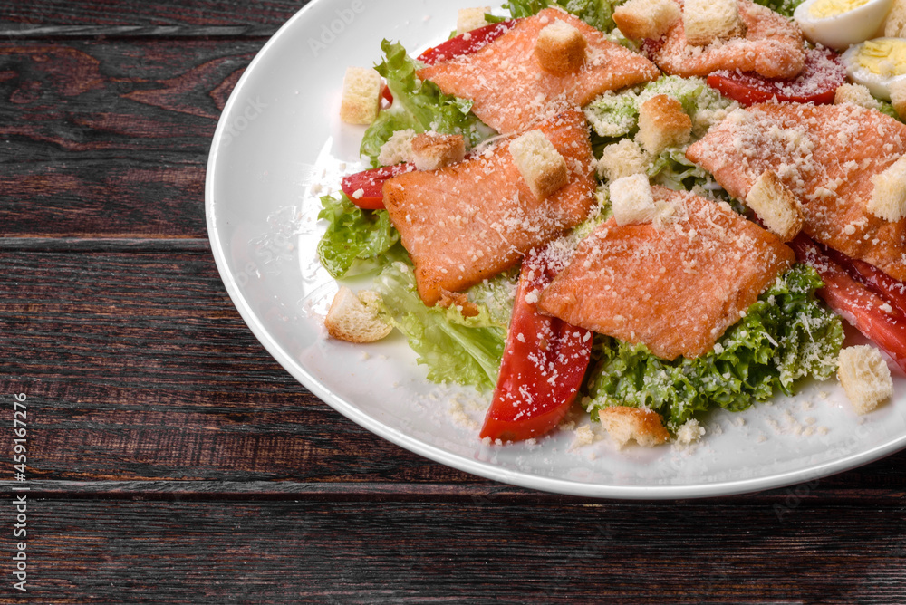 Delicious fresh salad with red fish for the festive table Delicious fresh salad with red fish for the festive table