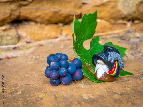 Romanian Decebalus Gnome near grape