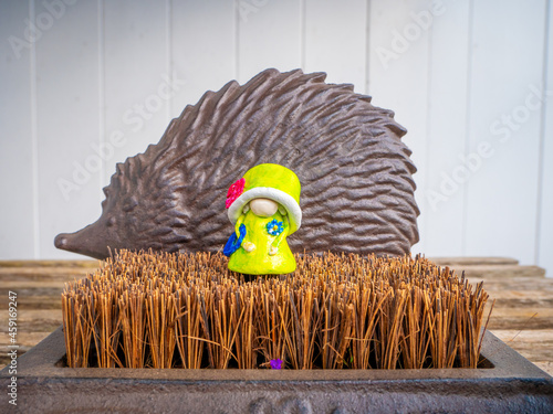 Wallpaper Mural Queen Gnome in front of a Metal Hedgehog in the Garden Torontodigital.ca