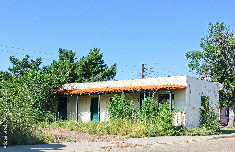 Old Abandoned Motel Units With Overgrown Weeds Old Abandoned Motel Units With Overgrown Weeds