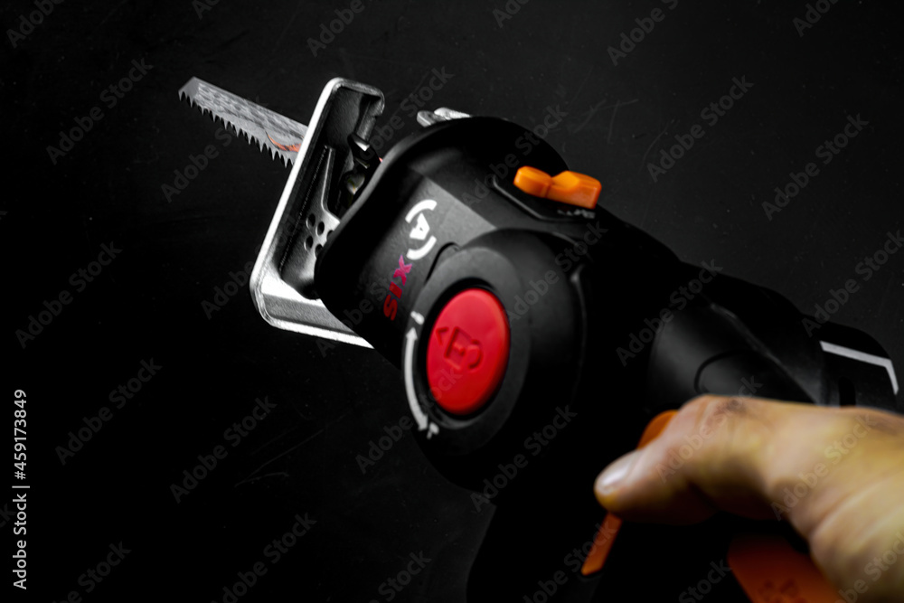 Human use of a reciprocating saw Human use of a reciprocating saw