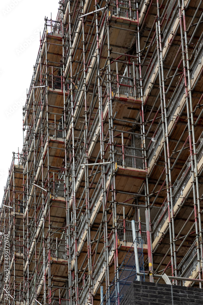 Scaffolding on an office building being converted to residential apartments 