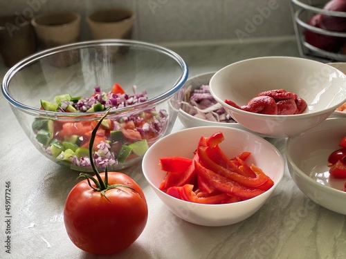 Home-cooked meal and preparations. Vegetables, Berries,  and sauce.