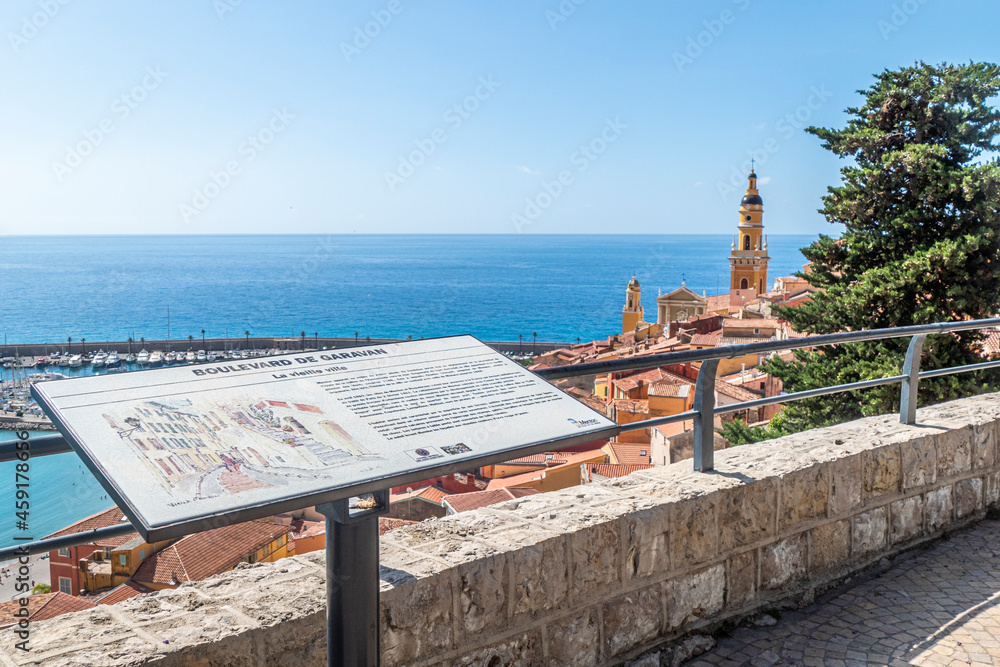 aerial view of the historic center of Menton with the beautiful Basilica and blue sea