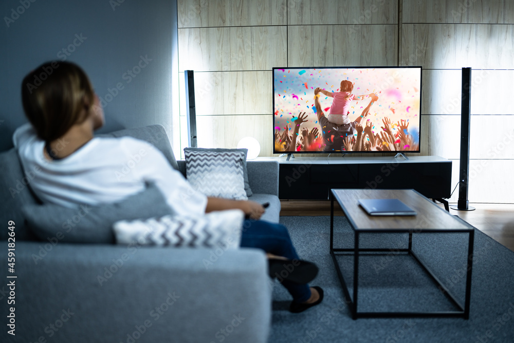Woman Watching TV Movie. Enjoying Cinema Woman Watching TV Movie. Enjoying Cinema