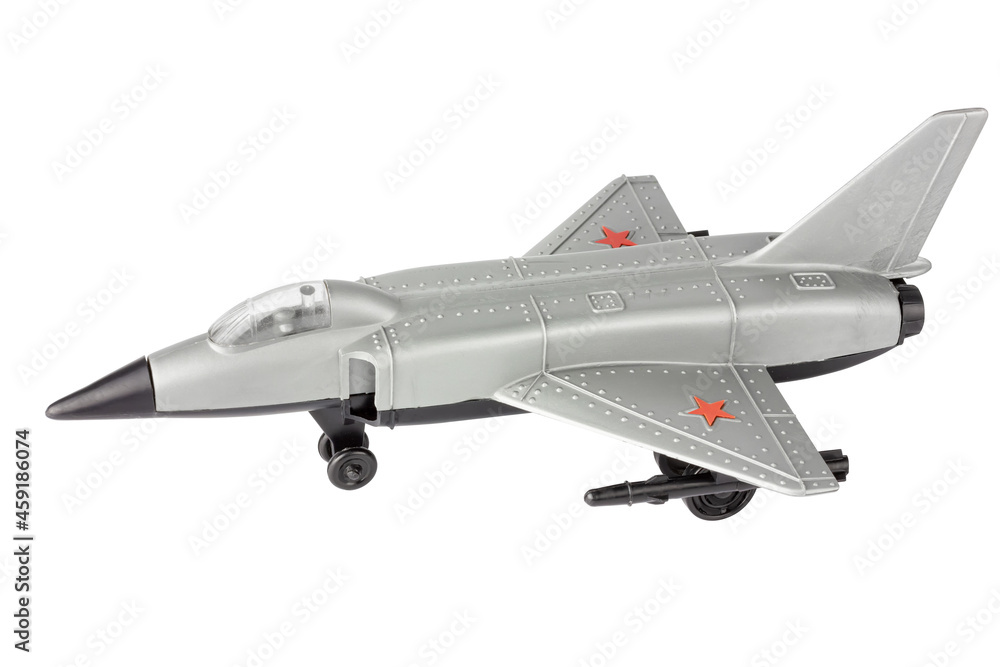 Russian military fighter. A toy. Isolate on a white background. Airplane toy. Russian military fighter. A toy. Isolate on a white background. Airplane toy.