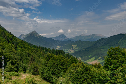 View of Bauges Massif with the tooth of Arclusaz and the tooth of Rossanaz from the Buffaz pass in the french Alps