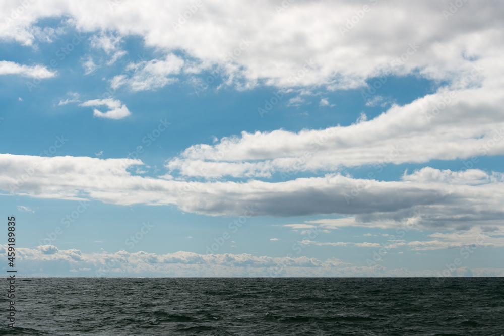 clouds over a lake, windy day clouds over a lake, windy day