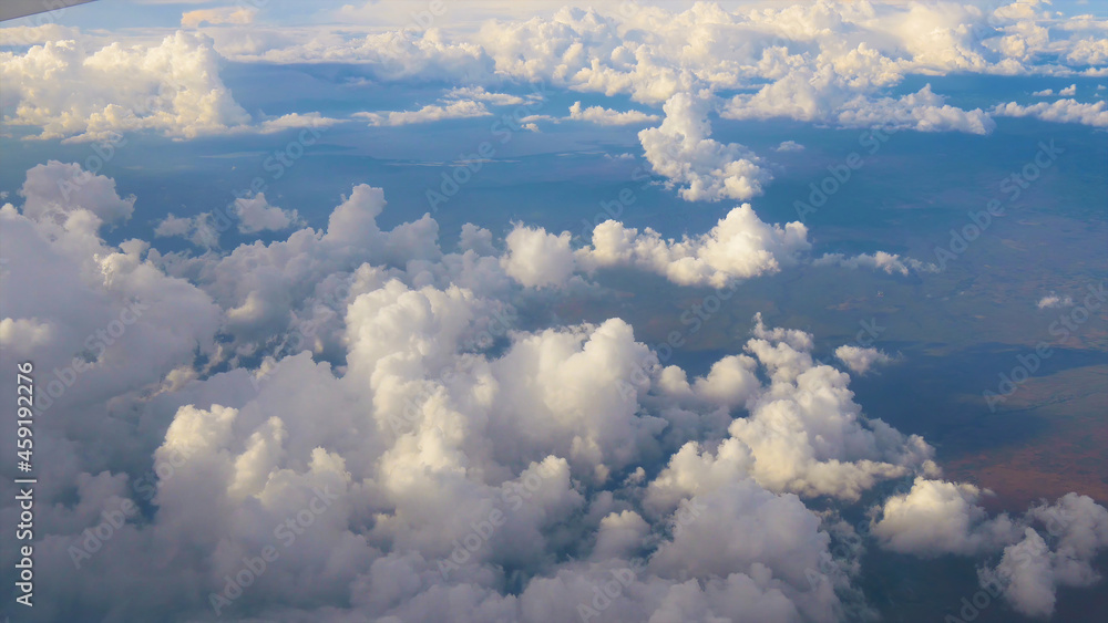 Expressive cumulus clouds lit by the sun Expressive cumulus clouds lit by the sun
