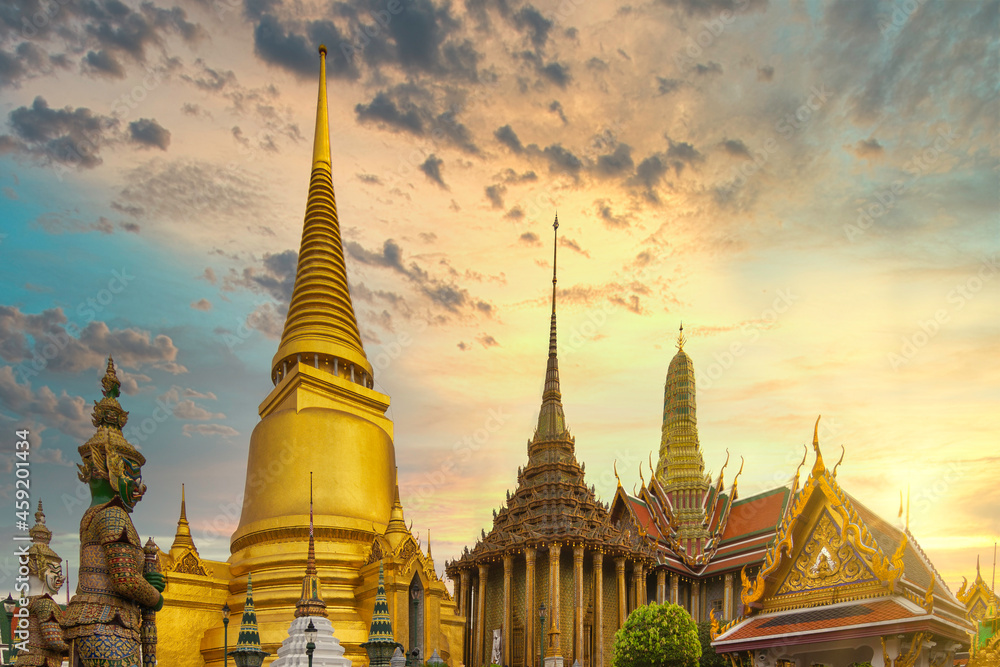 Fototapeta premium Grand architecture, used for ceremonial events. the buddhist temple of the emerald buddha templeat the grand palace in sunrise at Bangkok, Thailand.