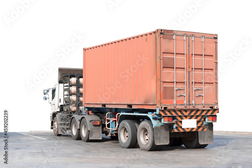 Truck container commercial delivery cargo on road isolated on white background with clipping path