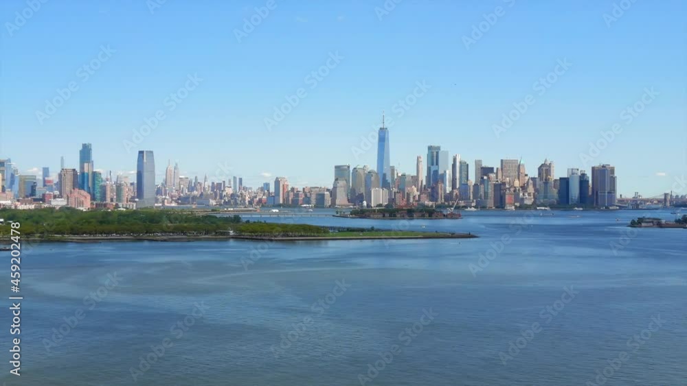 Epic Pan Right Aerial View of the Manhattan, Brooklyn and Statue of Liberty Skyline Epic Pan Right Aerial View of the Manhattan, Brooklyn and Statue of Liberty Skyline
