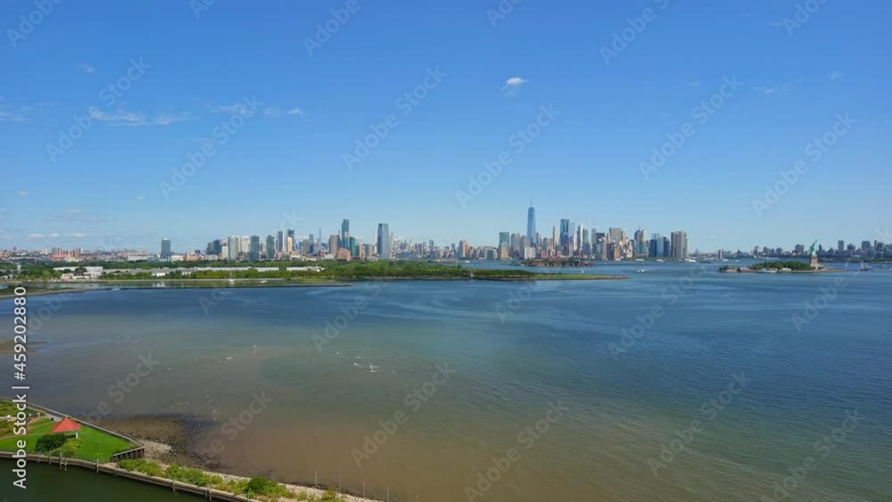 Distant Aerial Slider Shot of the Manhattan, Brooklyn and Statue of Liberty Skyline Distant Aerial Slider Shot of the Manhattan, Brooklyn and Statue of Liberty Skyline