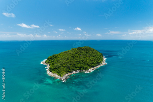 Aerial view landscape of small island in tropical sea against blue sky background Amazing small island at Phuket Thailand © panya99
