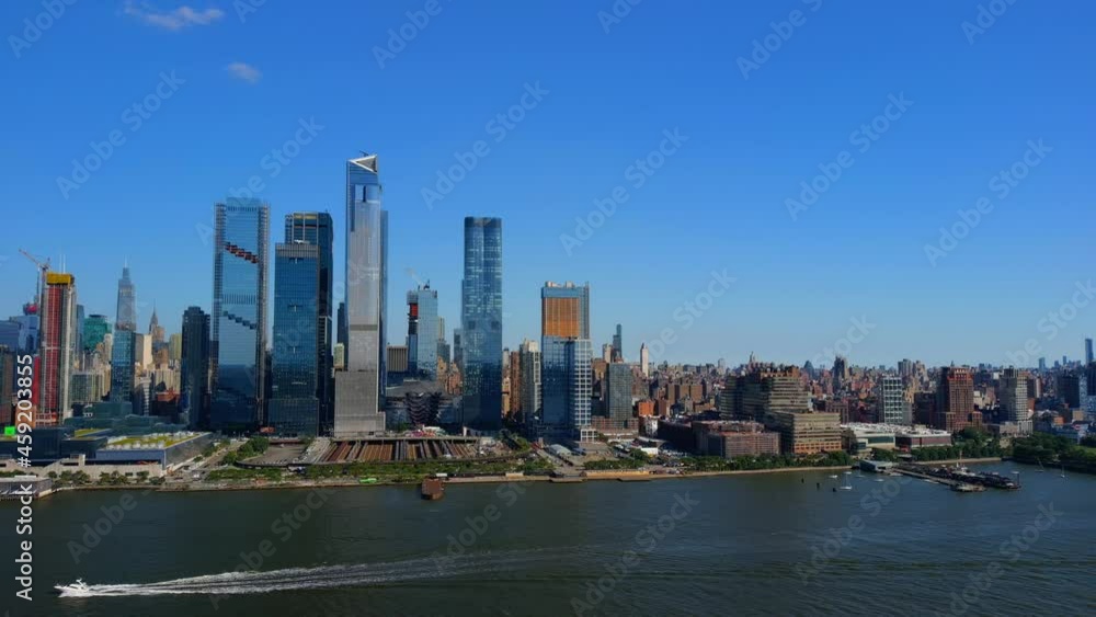 Descending Crane Shot of Waterfront Hudson Yards and the New York City Skyline Descending Crane Shot of Waterfront Hudson Yards and the New York City Skyline