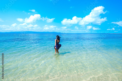 Fotografie woman in blue dress on the beach, at leela beach koh phangan ,suratthani,thailan