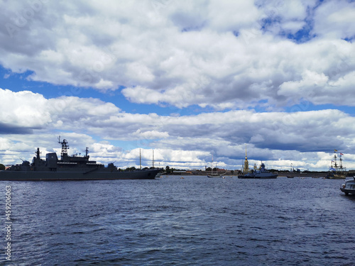Warships  frigates and sailboats built in the Neva water area for the Day of the Navy in St. Petersburg.