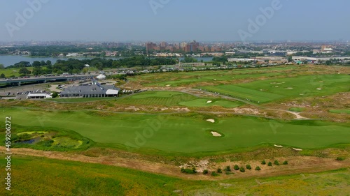 This is an aerial view of the Trump Links Golf course at Ferry Point in the Bronx, NY.  photo