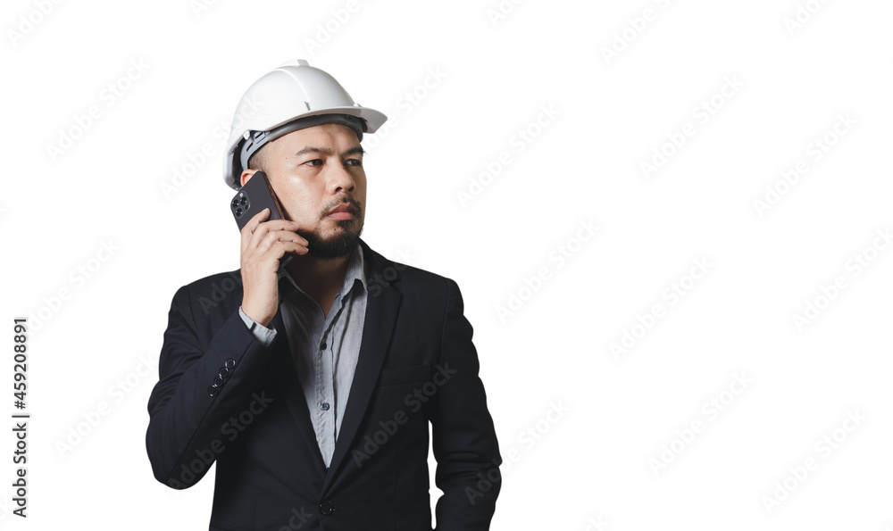 asian engineering man wearing hardhat talking a mobile phone isolated on white background, clipping path. asian engineering man wearing hardhat talking a mobile phone isolated on white background, clipping path.