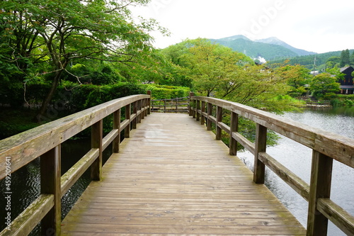 Fototapeta Naklejka Na Ścianę i Meble -  Wooden Bridge over Kinrin Lake in Yufuin, Oita, Japan - 日本 大分県 湯布院 金鱗湖	木製の橋