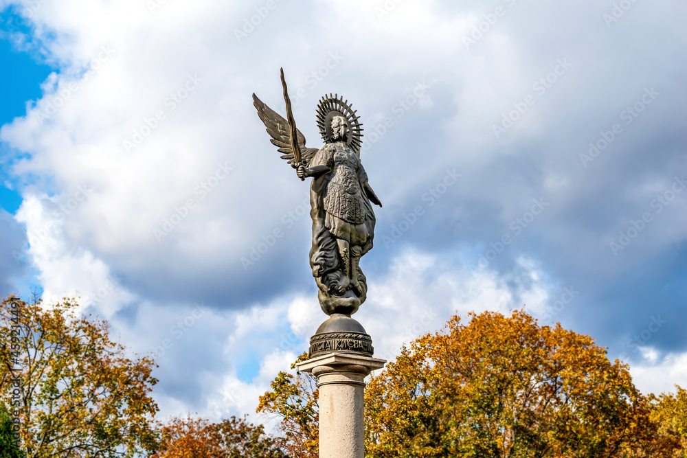 Fototapeta premium Kharkiv, Ukraine - October 20, 2020: The Archangel Michael Sculpture in Shevchenko City Garden in Kharkiv. Authors - sculptor Vitaly Sivko and architect Viktor Bobrovsky (2004)