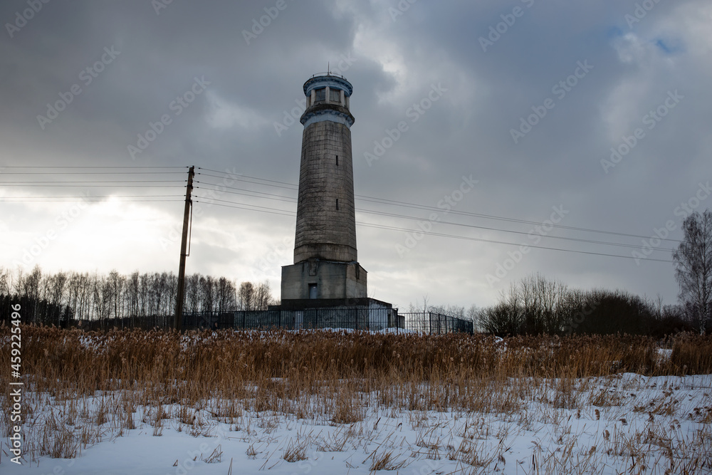 A view on a winter day at Big Volzhsky lighthouse on the river. Dubna city, Moscow region, Russia.
