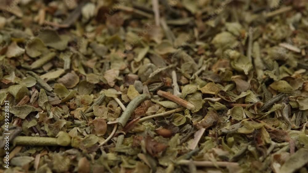 Dry Italian seasoning close up, sprinkle and rotate. 4K UHD video Dry Italian seasoning close up, sprinkle and rotate. 4K UHD video