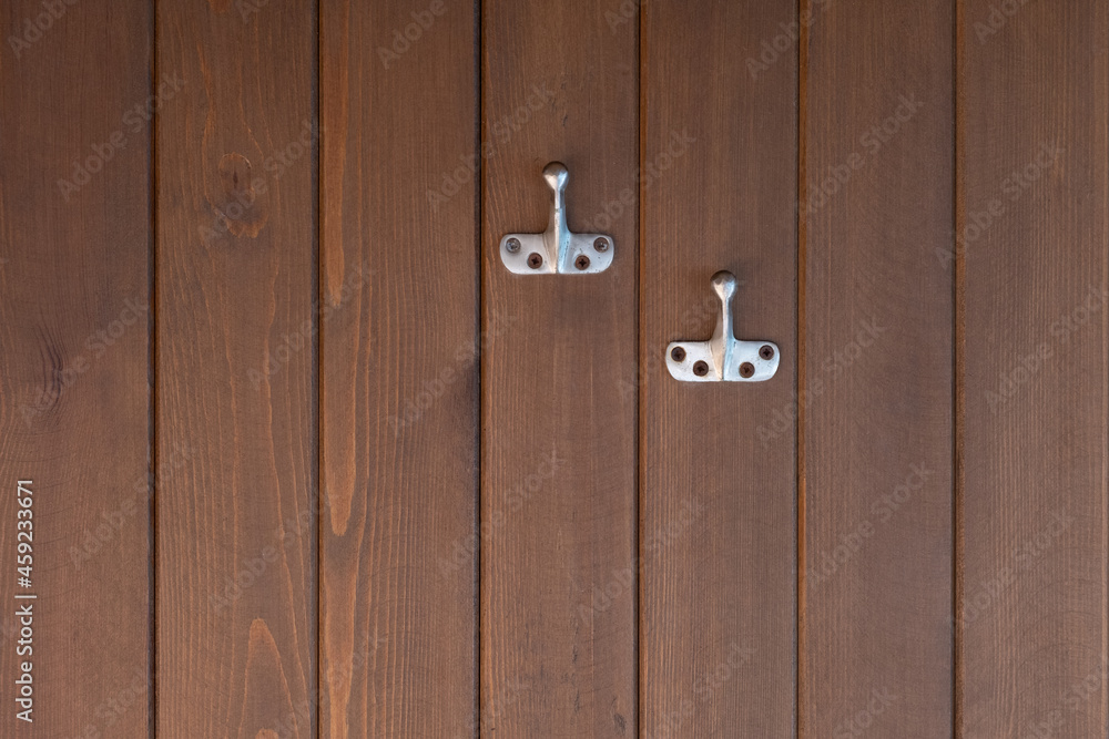 clothes hanger on wooden wall clothes hanger on wooden wall
