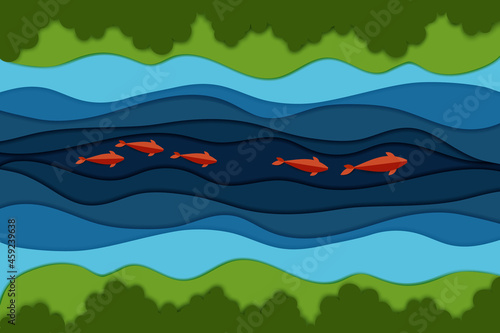 Paper cut river and fish.Top view of the water stream, shore and green bushes and forest.