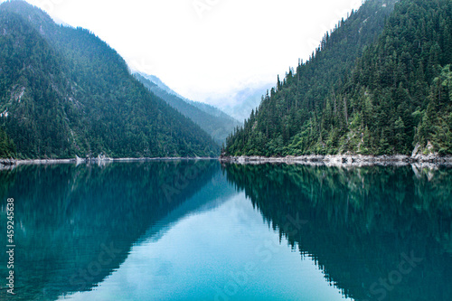 Mirror image of the mountains in the Long Lake, in the Jiuzhaigou Valley