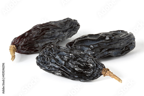 Wallpaper Mural Three berries of black raisins dried in shade on a white background. Front view. Full depth of field. With clipping path Torontodigital.ca
