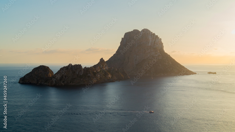 The Nature Reserves Es Vedra, Es Vedranell i els Illots de Ponent in Ibiza (Balearic islands, Spain). Sunset with views of the Mediterranean Sea and the islets of Es Vedra and Es Vedranell.