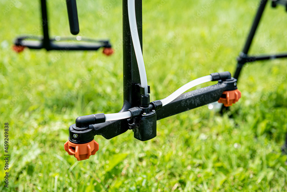Professional agriculture drone on the green field Professional agriculture drone on the green field