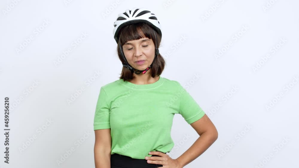 Young woman with bike helmet over isolated background showing and lifting a finger in sign of the best over isolated background Young woman with bike helmet over isolated background showing and lifting a finger in sign of the best over isolated background