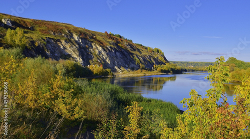 Mount Grekhovskaya with rocky gypsum outcrops on the left bank of the Sylva River