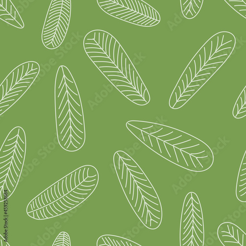 Seamless leaves pattern hand drawn on green background