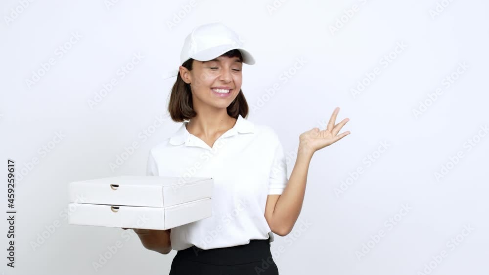 Young woman holding a pizza pointing finger to the side and presenting a product over isolated background Young woman holding a pizza pointing finger to the side and presenting a product over isolated background