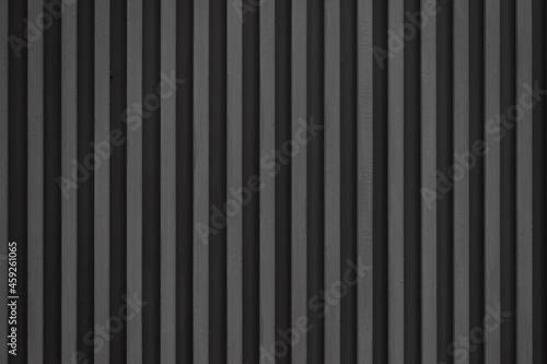 black steel stried background and texture. metal wall.