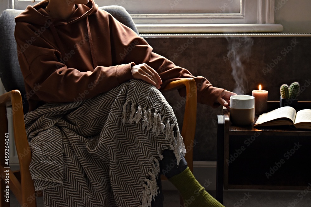 Hygge home interior. Cozy home and cup of coffee
Hygge home interior. Cozy home and cup of coffee