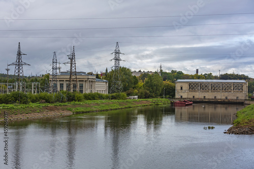 An old gateway on the Moscow Canal for adjusting the water level in the riverbed. A suburb of the capital. Moscow region, Russia