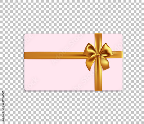 Blank pink gift card with realisticgold ribbon bow isolated photo