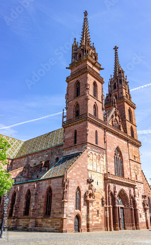 The famous red Basler Münster (Basel minster cathedral), built from red sandstone in Basel, Switzerland photo