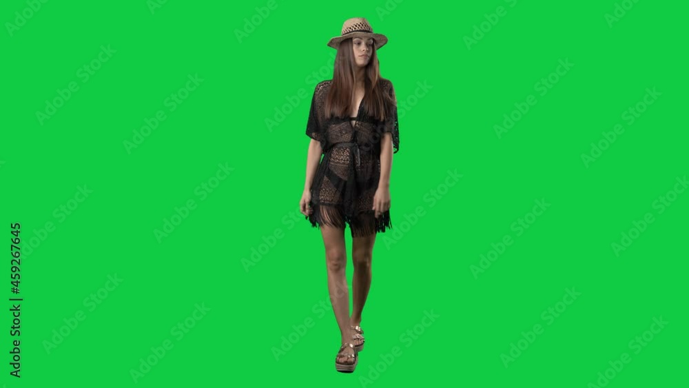 Lost or bored young woman in bikini swimsuit looking down walking and searching. Full body on green screen chroma key background Lost or bored young woman in bikini swimsuit looking down walking and searching. Full body on green screen chroma key background