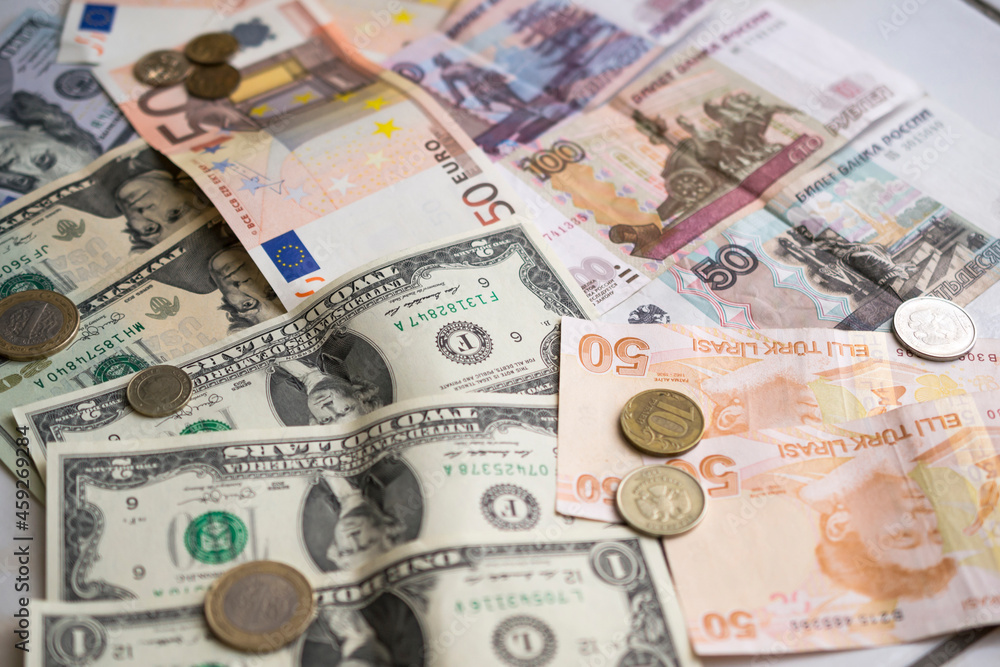 banknotes of Turkish lira, euro, rubles and dollars of different denominations with coins banknotes of Turkish lira, euro, rubles and dollars of different denominations with coins