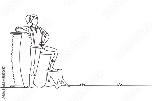 Continuous one line drawing beautiful woman lumberjack wearing suspender shirt, standing with big steel saw, posing with one foot on a tree stump. Single line draw design vector graphic illustration