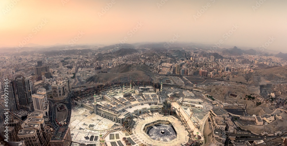 The holy mosque and Makkah city view from the top of Makkah clock tower during sunset. Hajj and event in Makkah