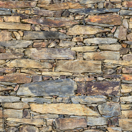 Natural stone wall. Seamless texture. Perfect tiled on all sides.